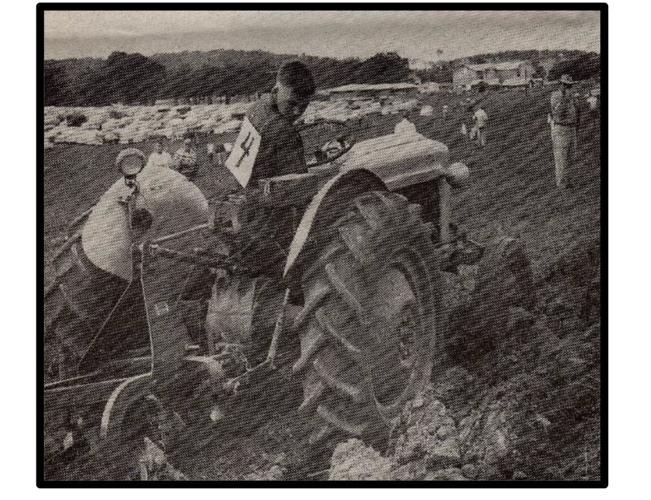 Youth plowing contestant takes care with his work during the 1956 show.