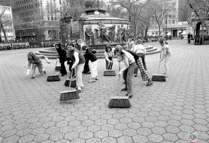Kids with brooms