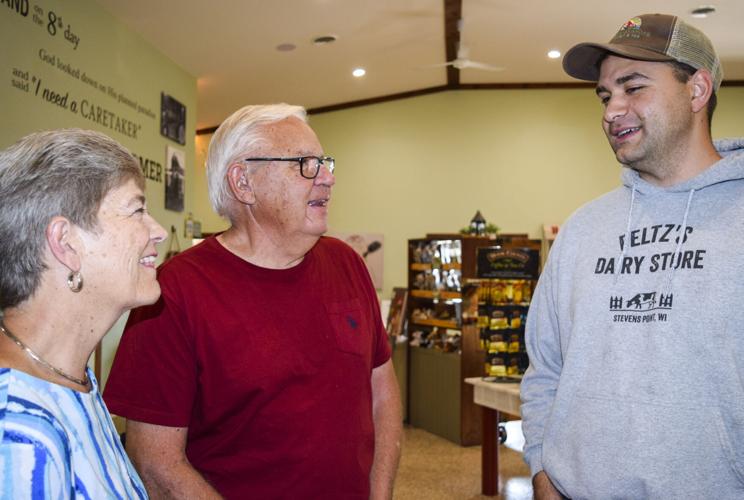 Janet and Arvid Liebe talking with Jake Feltz
