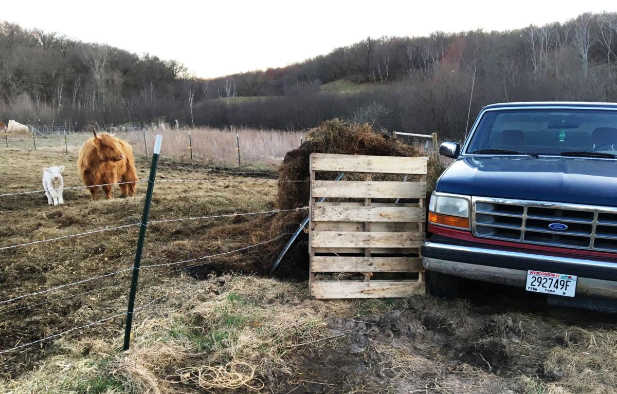 An old pickup and a pallet make for quick fence repair.