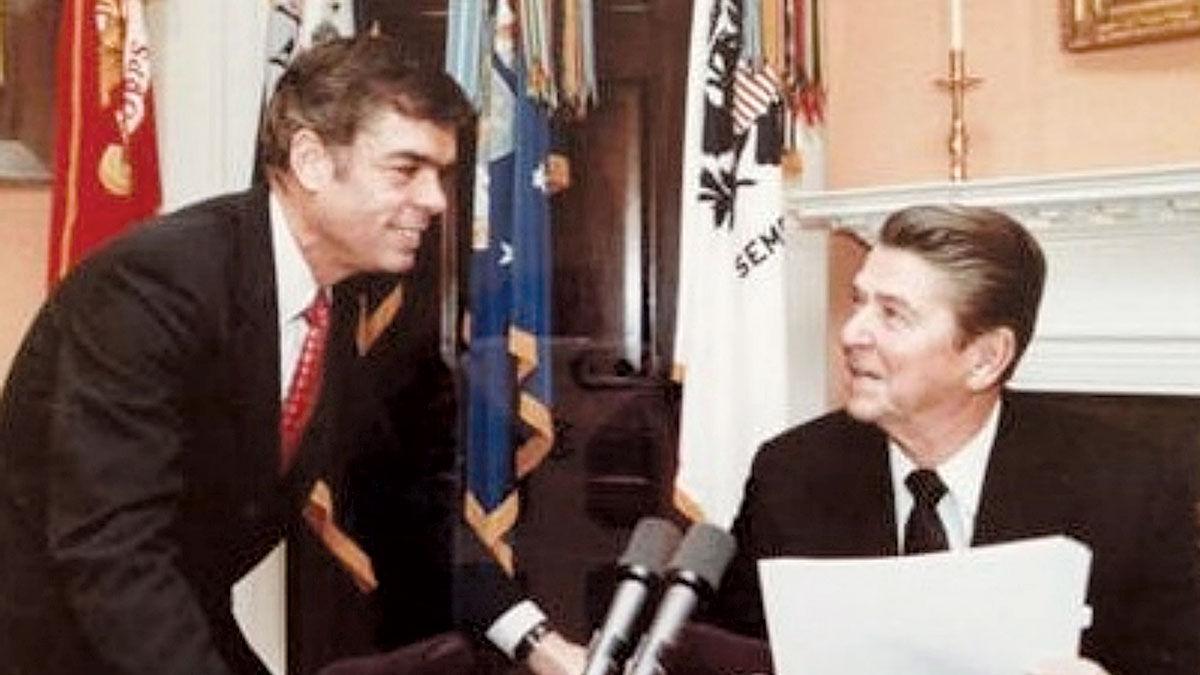 Block, shown with President Ronald Reagan