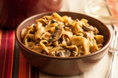 Beef stroganoff and poppy seed noodles