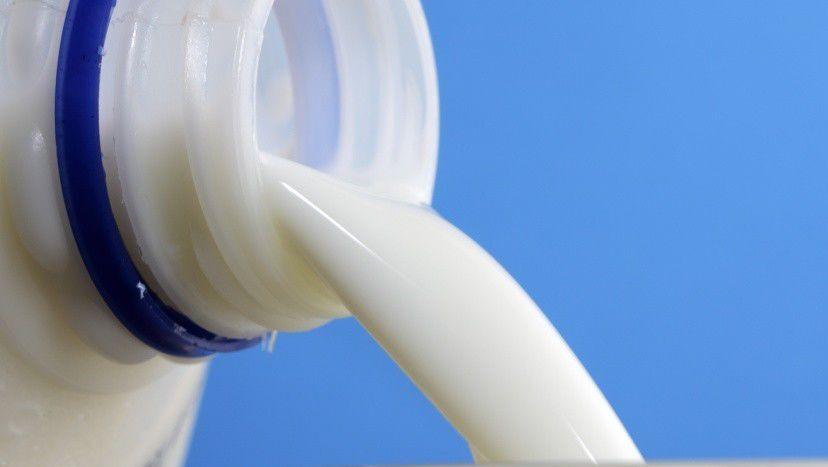 Milk pouring into glass