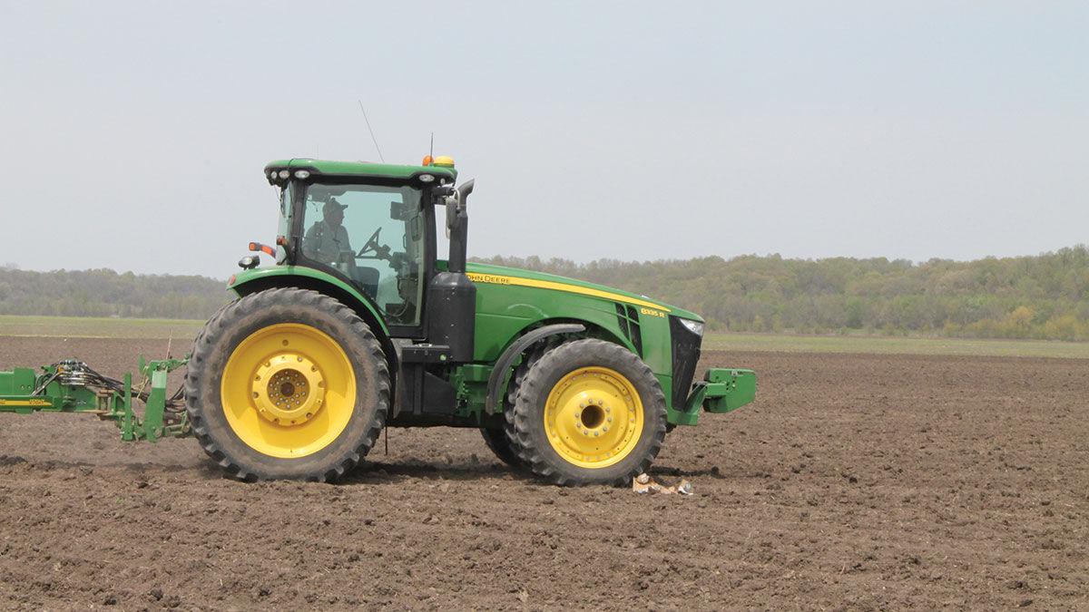 Troy McDannald plants corn in Central Missouri