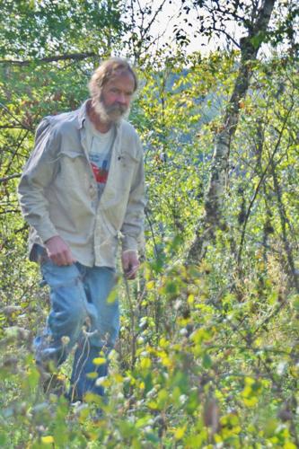 Wade Bulman through brush