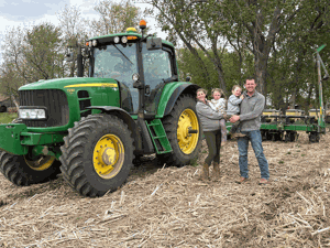 Central Iowa family works through wet, chilly spring together