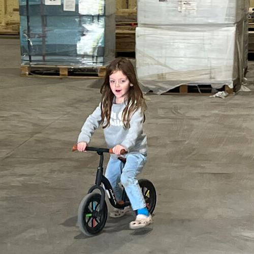 Lainey Kitzman bikes around the shop