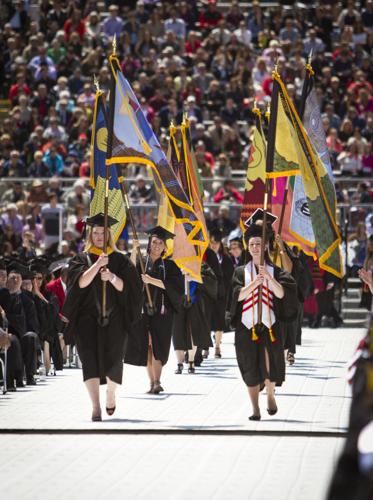 UW commencement flag bearers