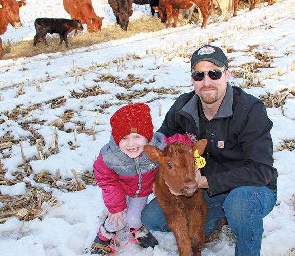 Jason McManis poses with his daughter, Halle.