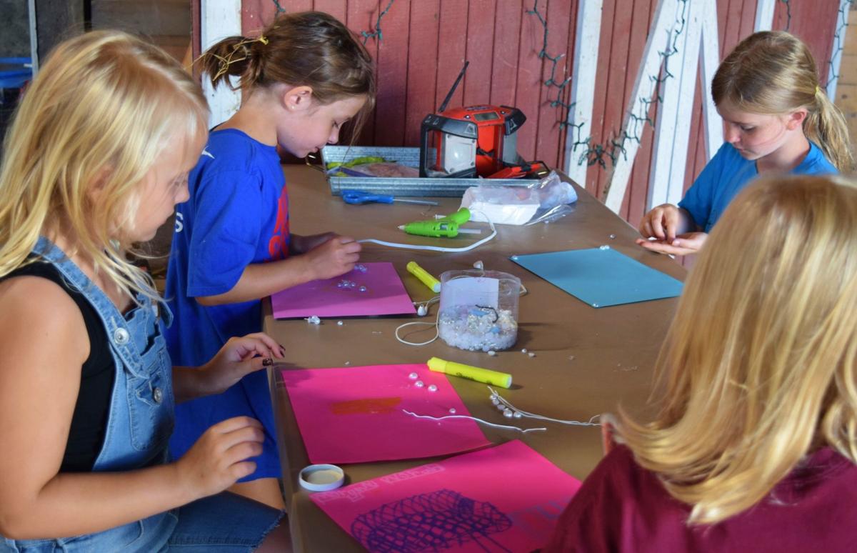 Daluge Farm Campers doing artwork