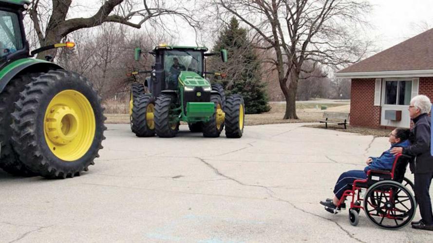 Dana Weeda watches tractors