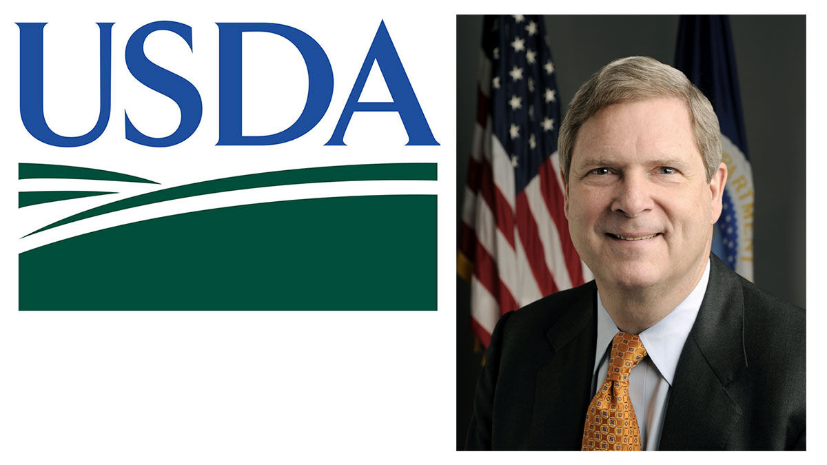 Vilsack with USDA logo