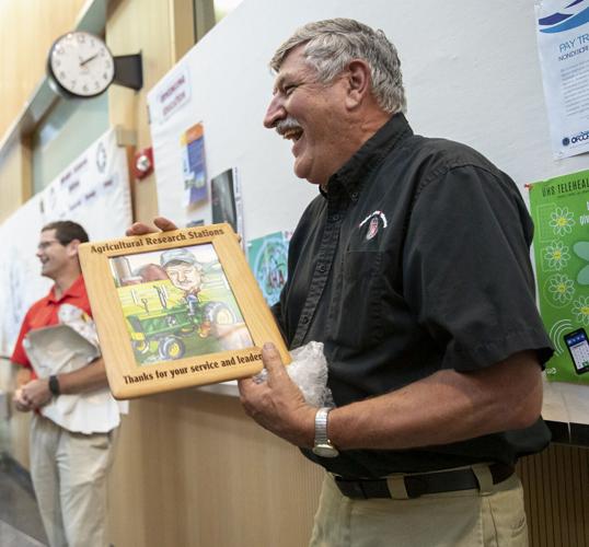 Dick Straub accepts gift