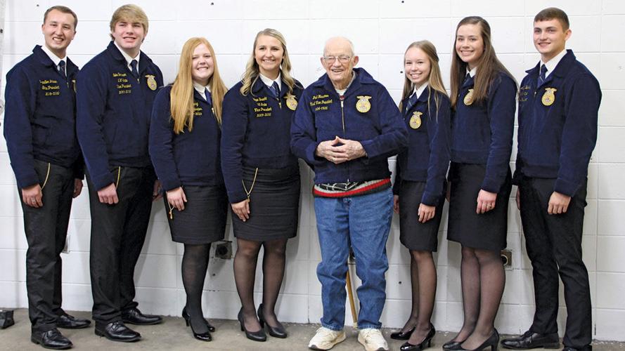 Paul Hassman poses with the Iowa FFA officers