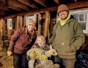 Esme Martinson, Josh Pearson and their daughter, Nori