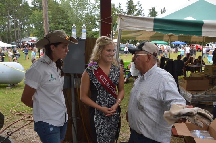 Crystal Siemers-Peterman meets with local grower Gary Bula and third-generation grower Megan Wallendal.