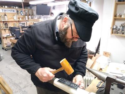 Tin smith