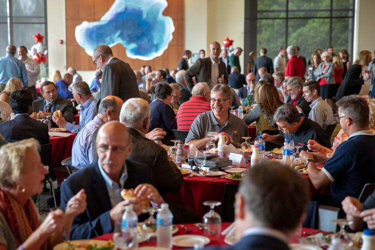 Attendees eat lunch