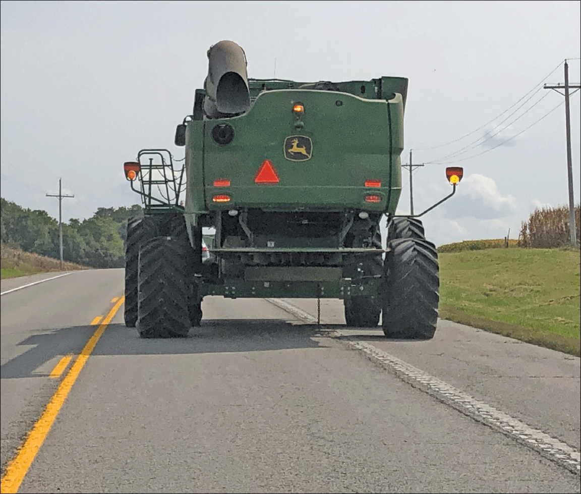 combine on highway