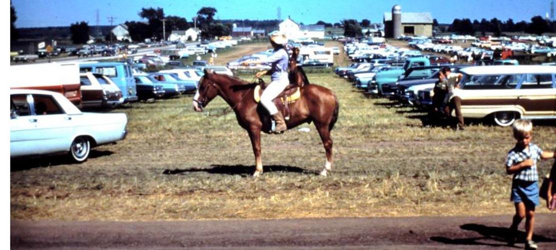 Early shows such as the 1969 Wisconsin Farm Progress Days in Brown County use horses in parking; later shows did not allow horses.