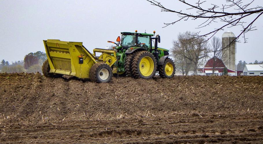 Rock picker in field