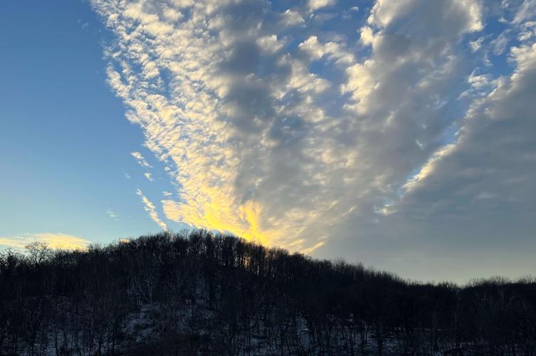 Hill with setting sun