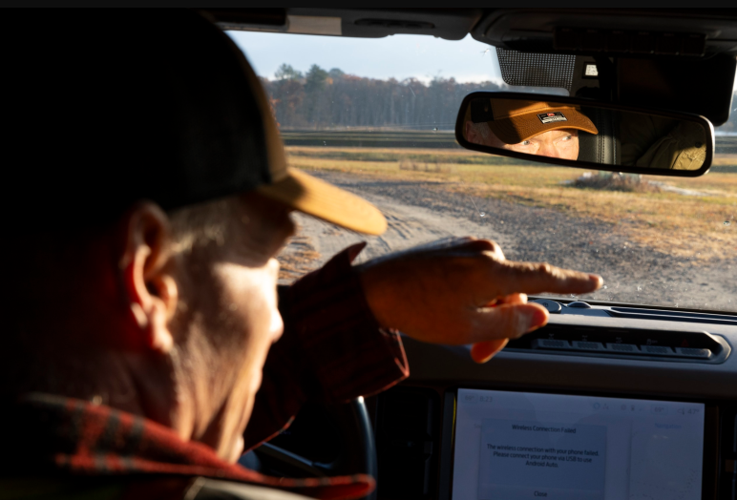 Hoffman drives by marshes