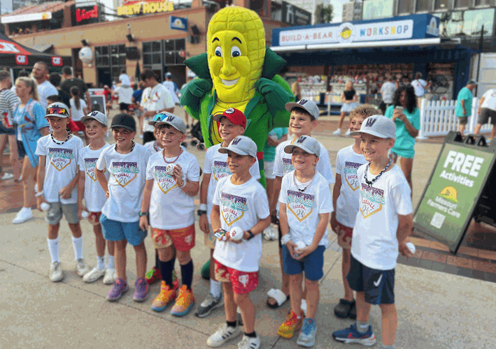 Captain Cornelius with baseball players