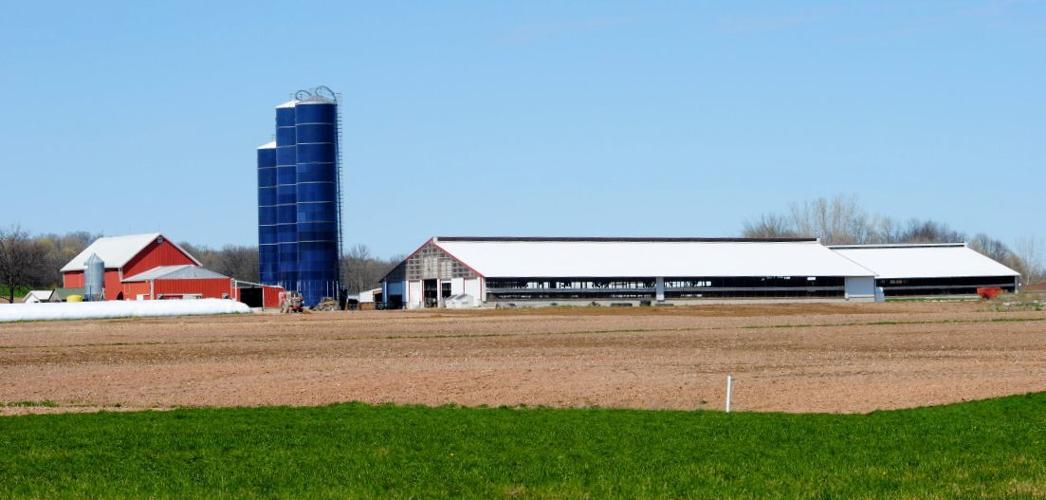 Farm has two manure-compost barns