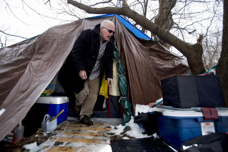 Brannon emerges from tent in winter