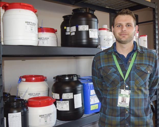 Sam Liegel with Driftless Extract products