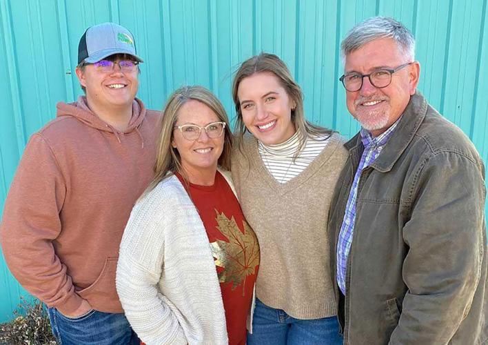 Renee Fordyce family photo by barn