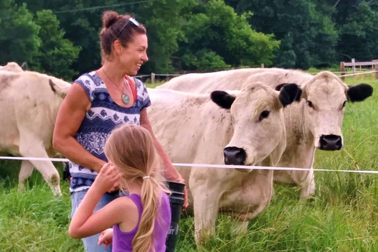 Rachel Bouressa with cattle