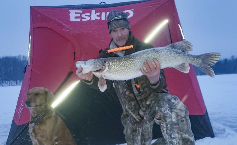 Mark Walters and dog with gator