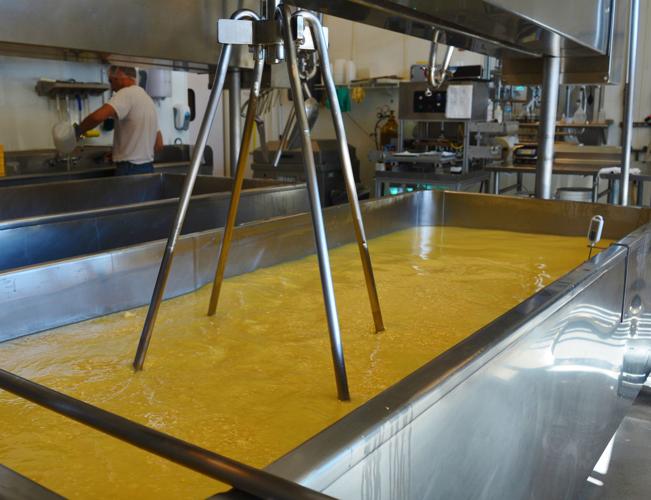 Ron Henningfeld works at a sink