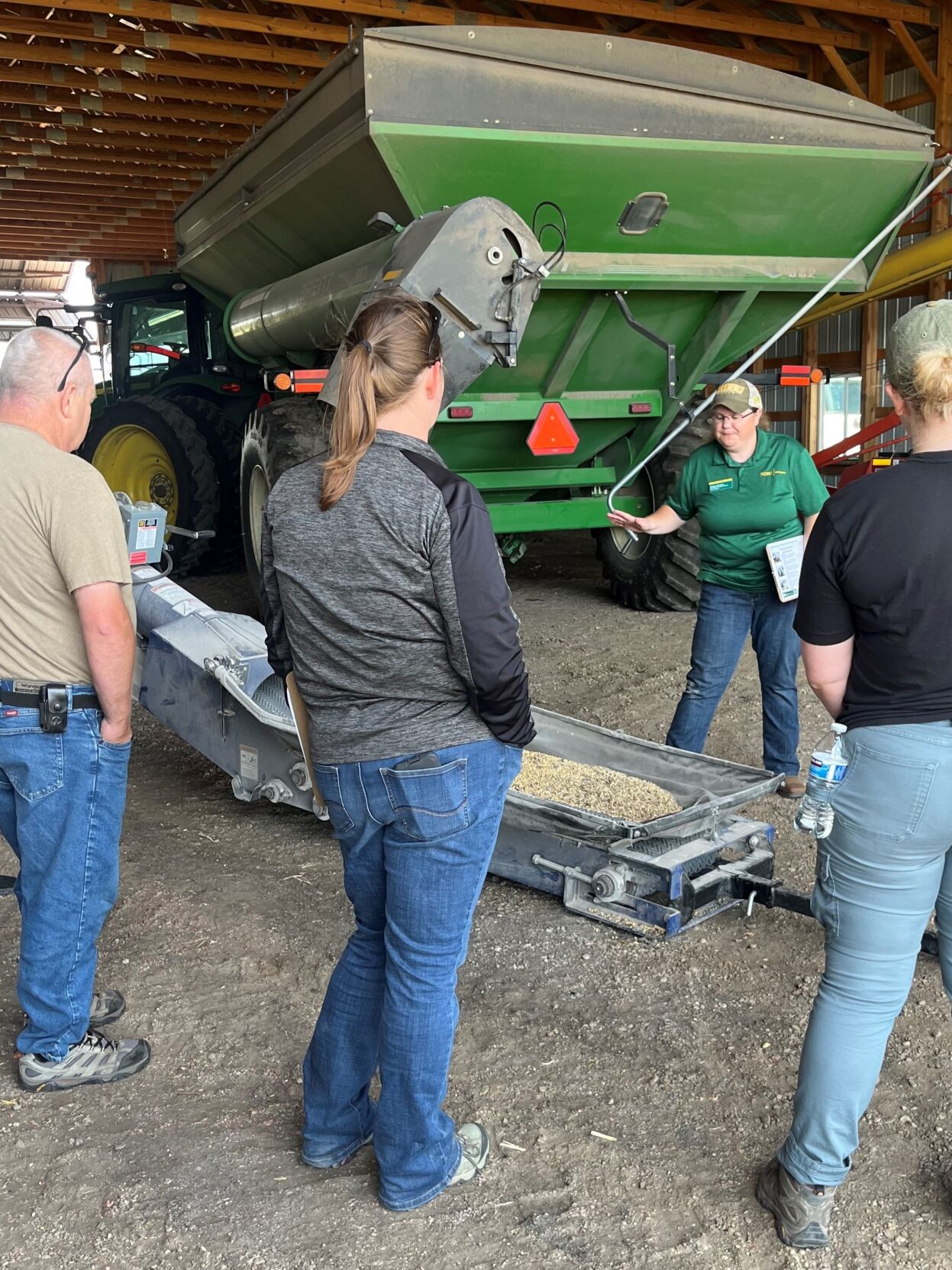 Angie teaching about auger safety