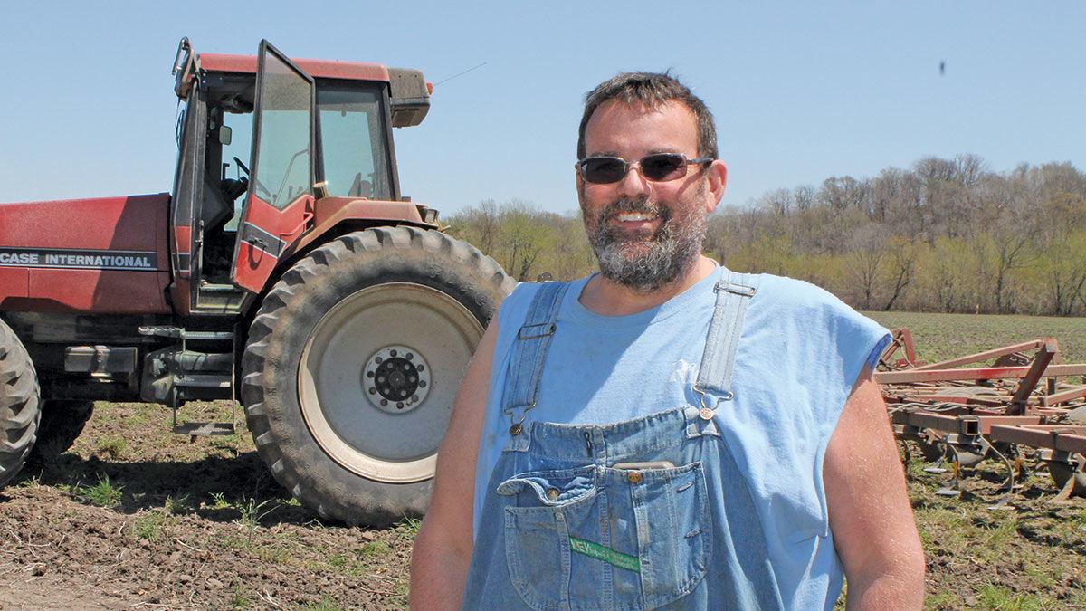 Mitchell Rice cultivates a field in Chariton County.