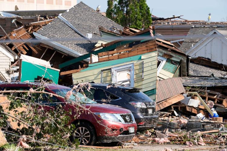 A damaged neighborhood following severe weather, including a tornado Monday, July 27, 2026, in Menasha, Wisconsin. Dan