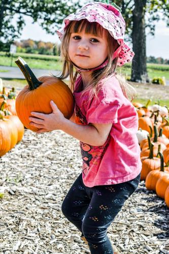 Delia Borton with pumpkin