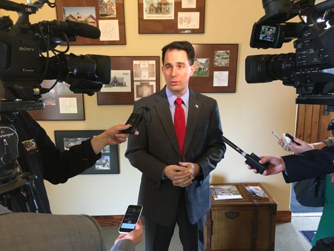 Gov. Scott Walker touts higher standards for open government