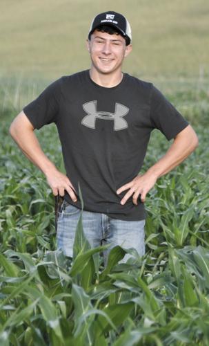 Kaleb Ellis in corn field