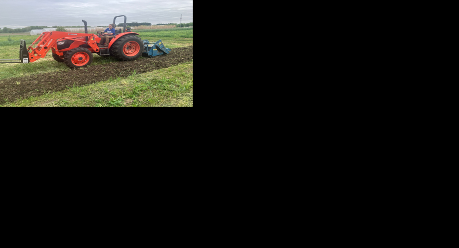 Lia Basden on tractor