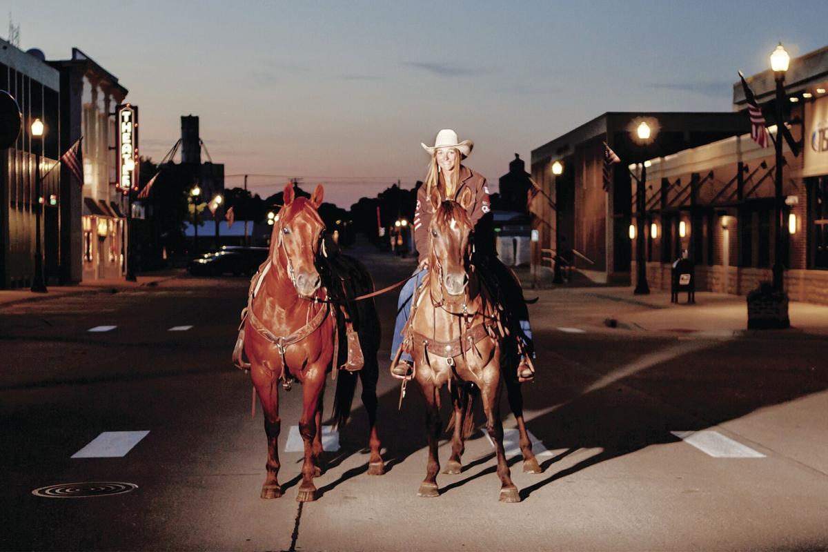 Cowgirl on horseback