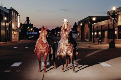 Cowgirl on horseback