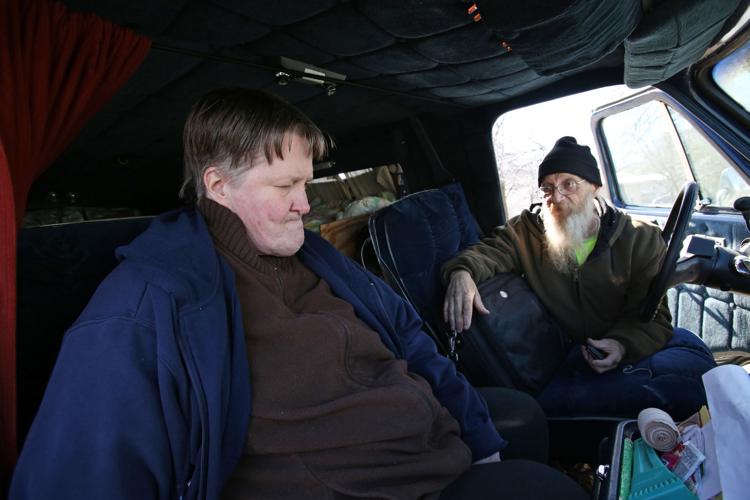 Roy and Cindy Jacobs in van front seat