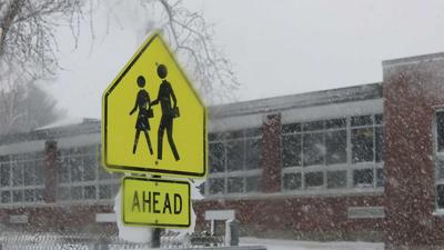 school-sign on snowy day