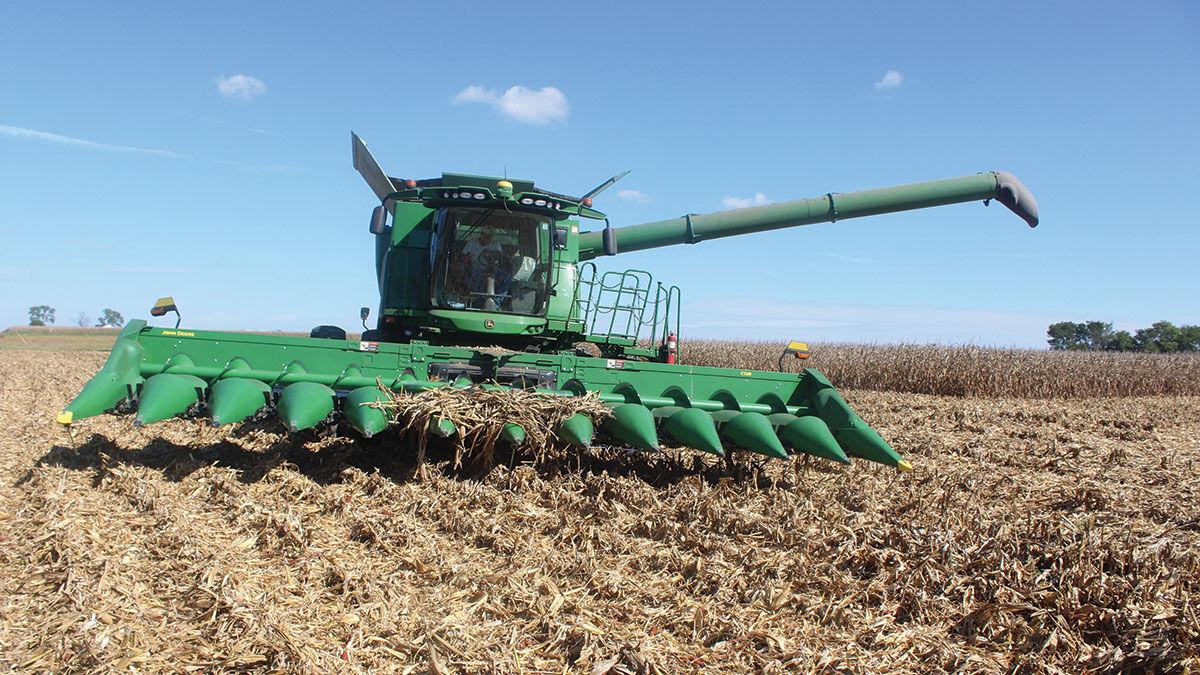 Joe Kehrer shells corn