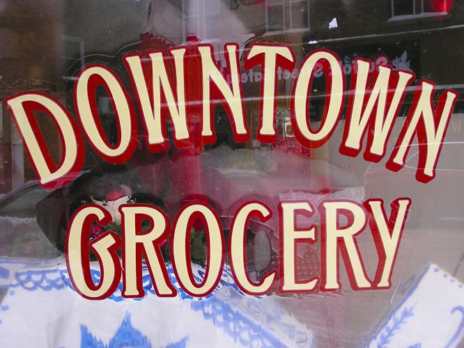 Downtown grocery sign