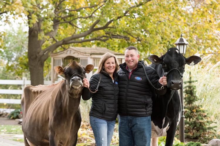 Kelli and Tom Cull with champion cows