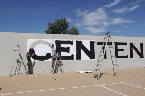 Beautification at Centennial: Parent paints school mural | Community